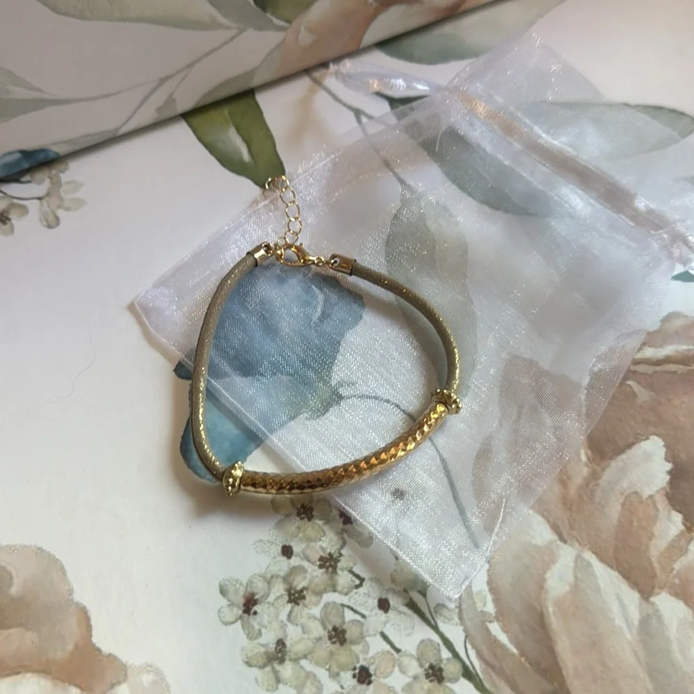 Elegant Gold and Tan Bracelet